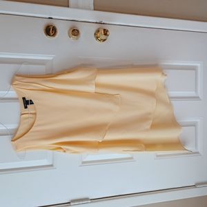 White House Black Market sleeveless yellow high low tunic size M